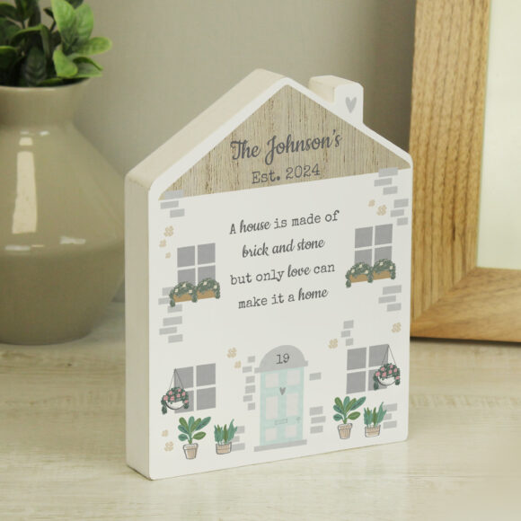 Personalised Love Makes A Home Wooden House Ornament